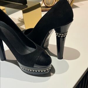 CHANEL Black suede with black patient leather Cap toe . Pearl detail